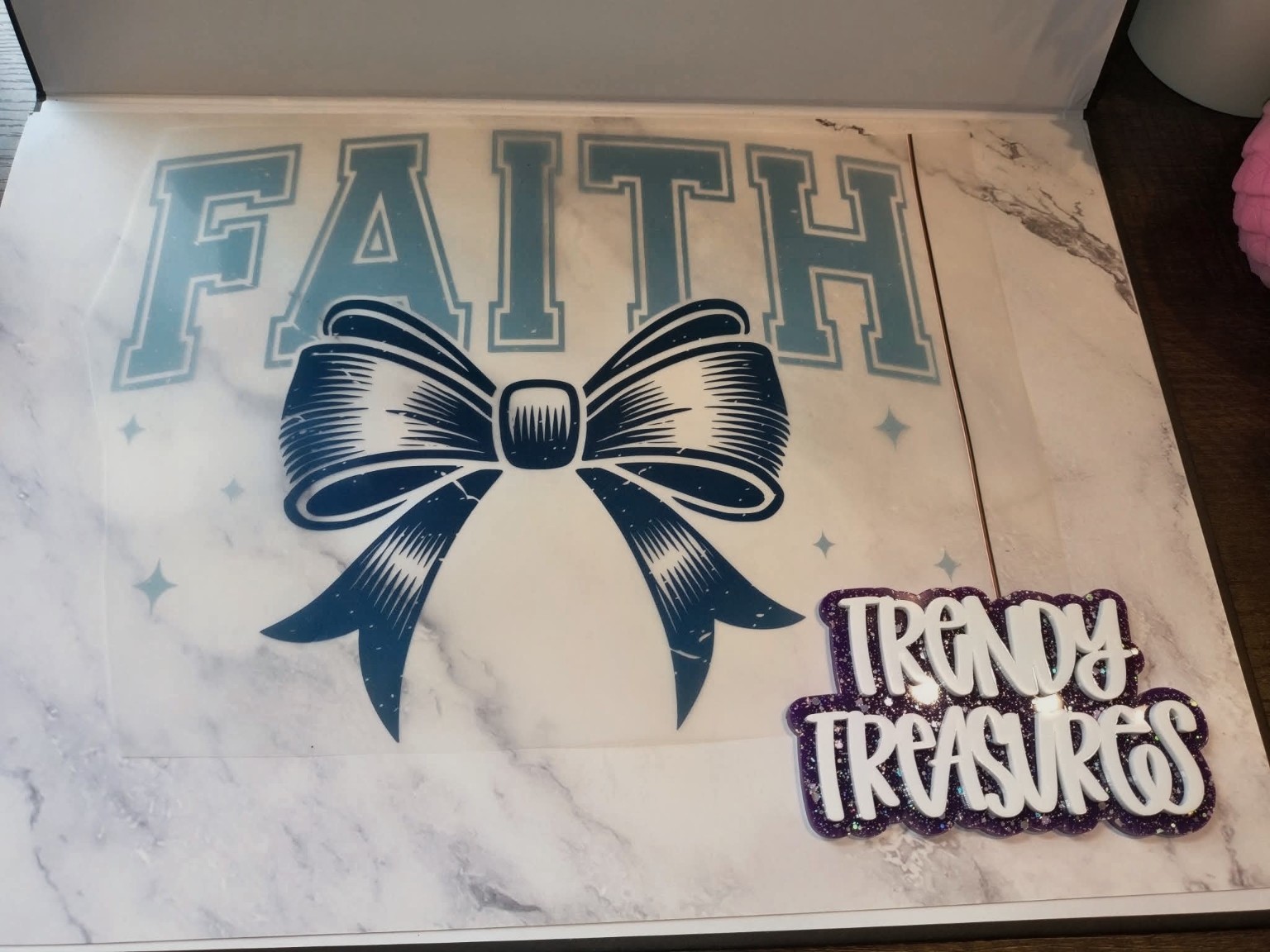 Faith—Blue Varsity Bow design reference, not a finished garment